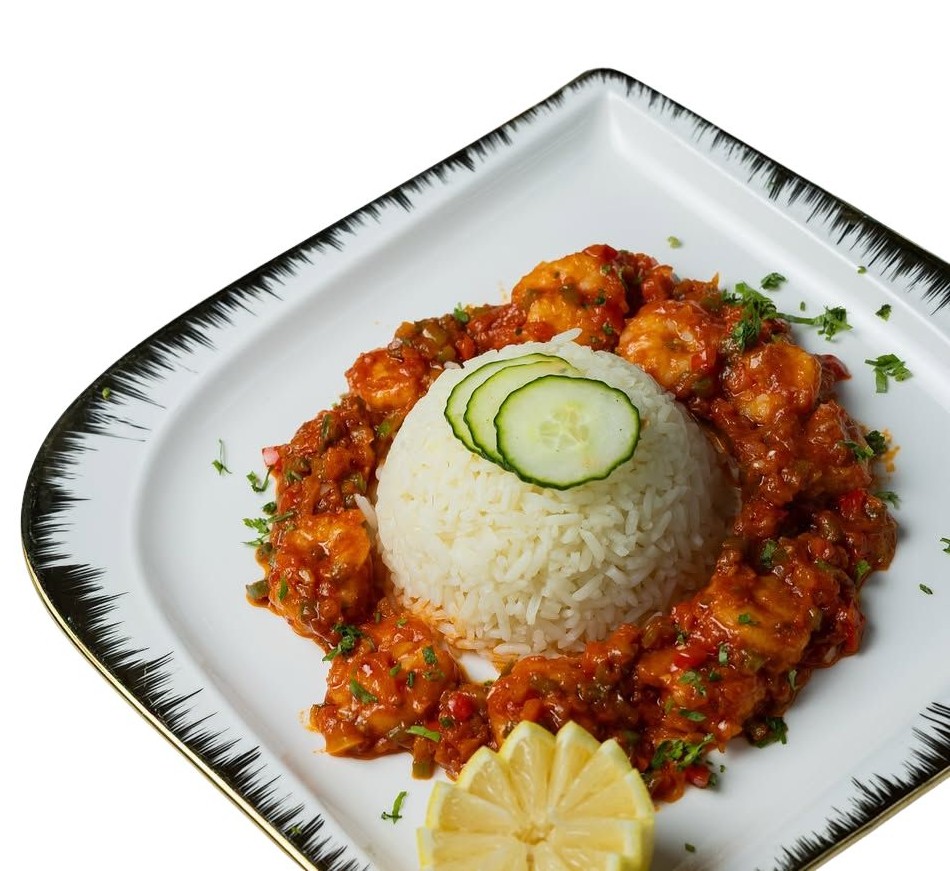 Shrimp sautéed in aromatic sauce served with rice