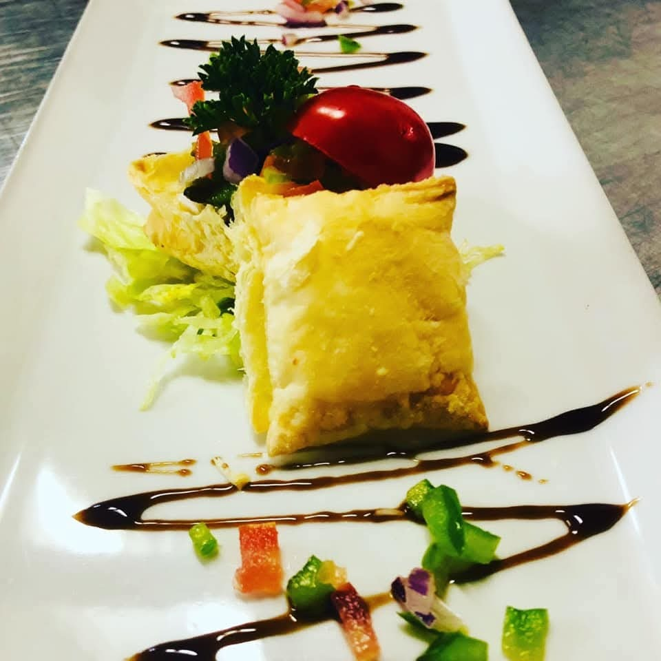 Signature plated dish showcasing culinary creativity